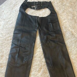 Brand new black leather chaps without tags.